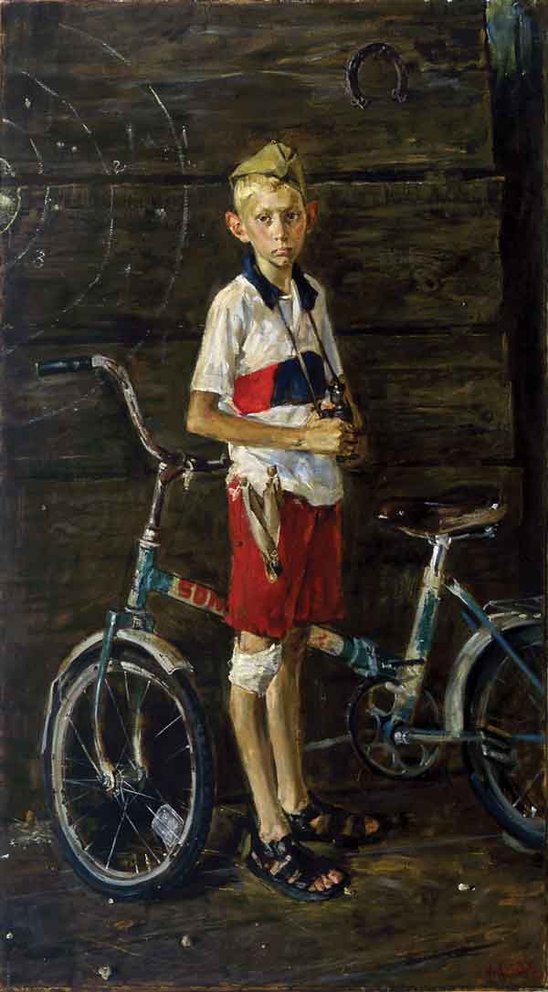 Мальчик с велосипедом.