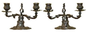 Pair of candelabra for two candles.