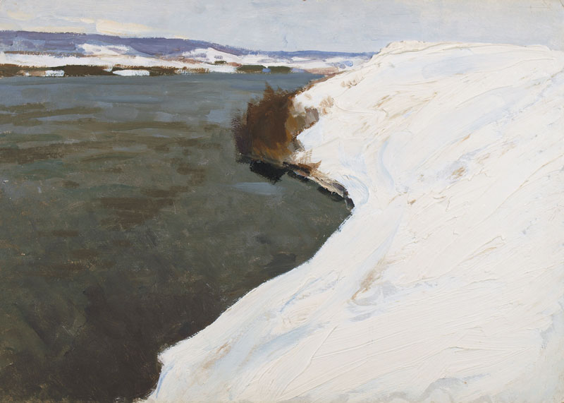 By the river.