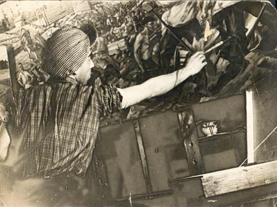 S. Dudnik is working on a painting.