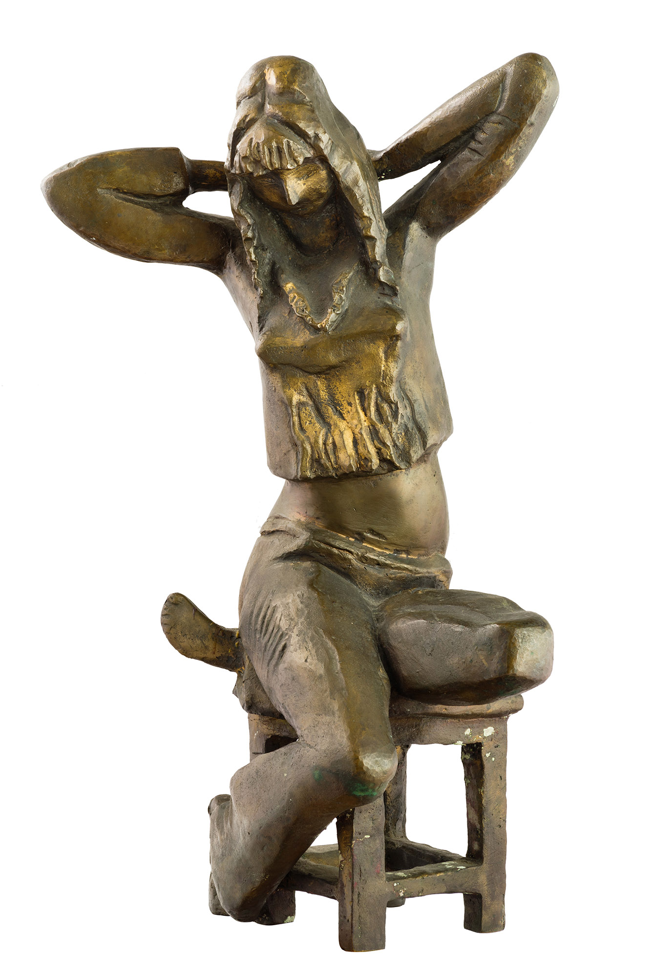 A girl sitting on a stool.