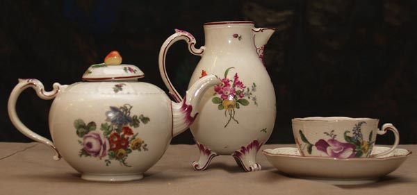Germany. Teapot, milk jug and cup and saucer.