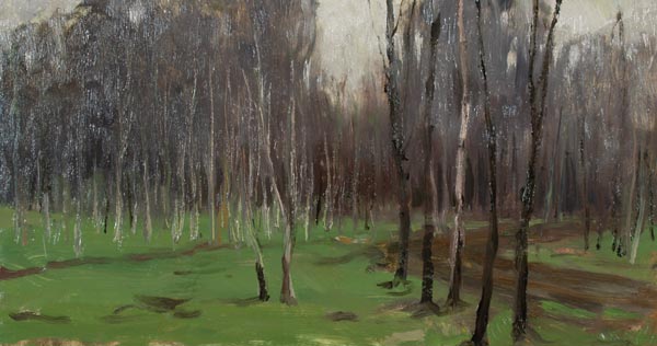In the shade of the trees.